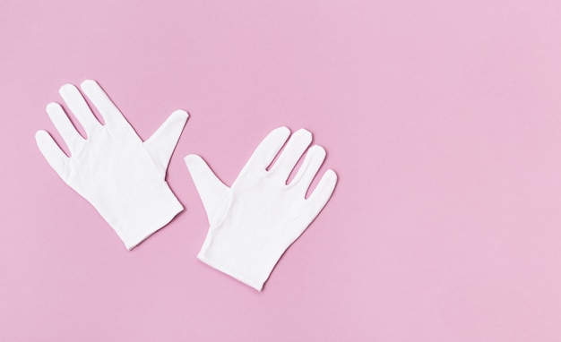 写真 白い綿生地の手袋のペア