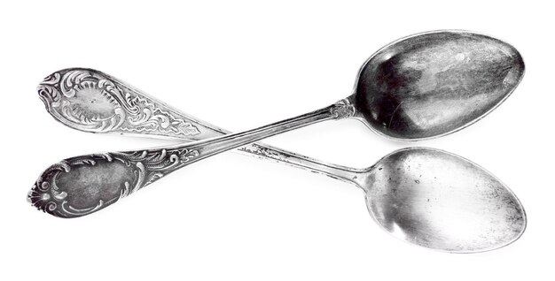 Photo pair of tablespoons isolated on white