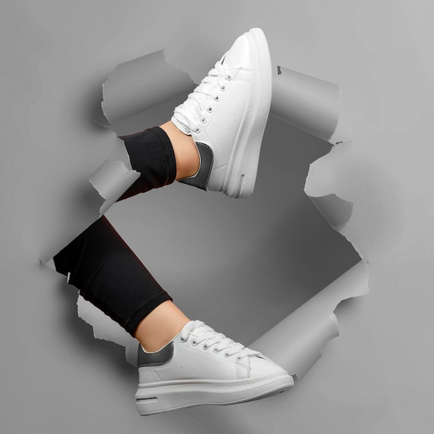 Pair of trendy sport sneakers White high fashion streetwear trend