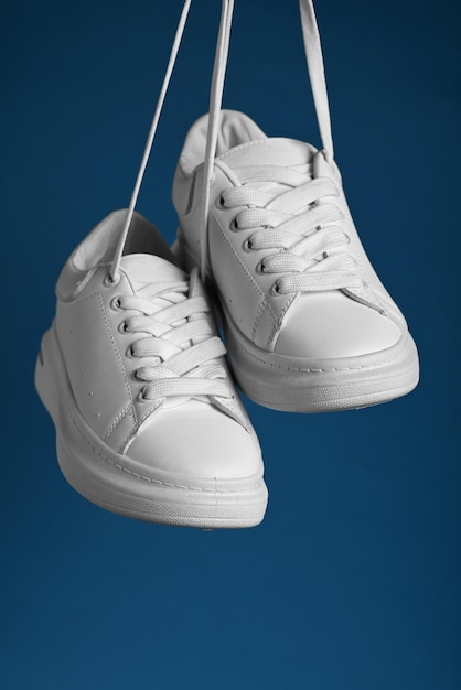 Pair of trendy sport sneakers White high fashion streetwear trend