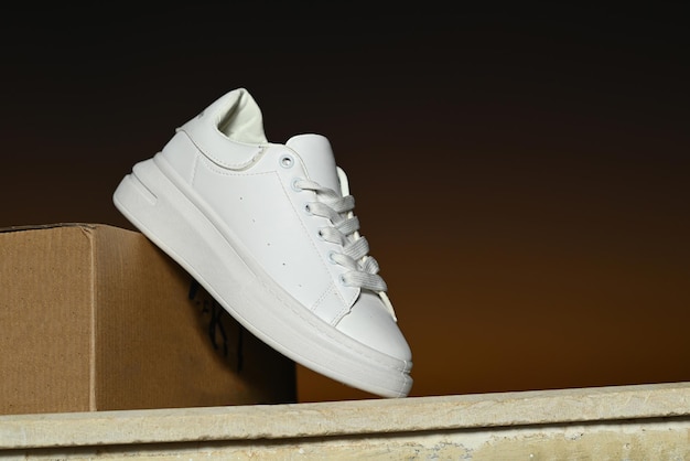 Pair of trendy sport sneakers White high fashion streetwear trend