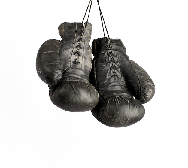 Pair of very old vintage black leather boxing gloves