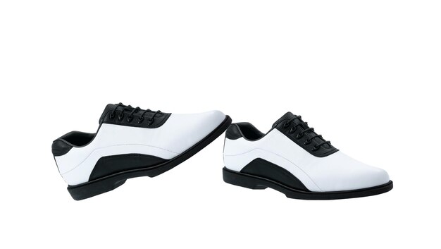 A pair of white golf shoes