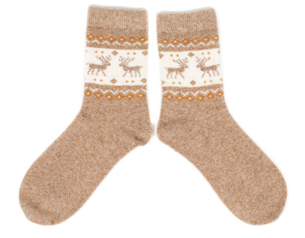 Photo pair of wool socks with a pattern deer