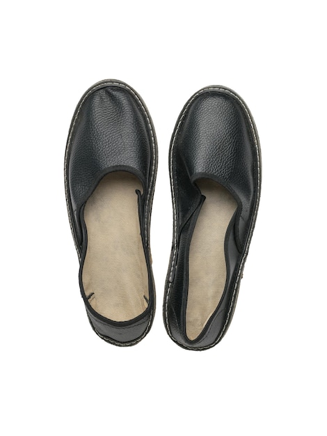 A pair of work slippers made of genuine leather insulated on a white background