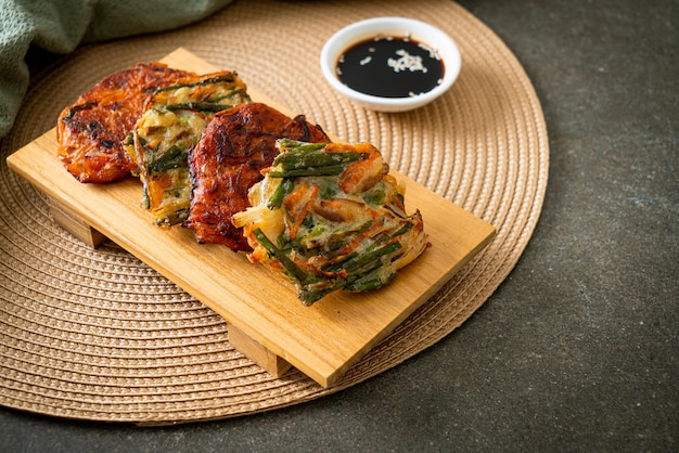 Pajeon or Korean pancake and Korean Kimchi pancake or Kimchijeon on white background