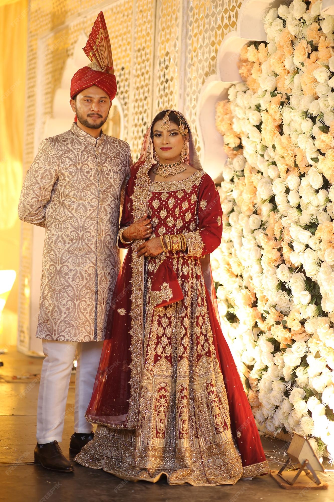 Premium Photo | Pakistani wedding couple asian bridal dresses or indian  bridal outfits or bridal dress design