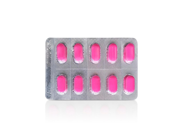 Pakket van roze pillen Apotheek en geneeskunde concept