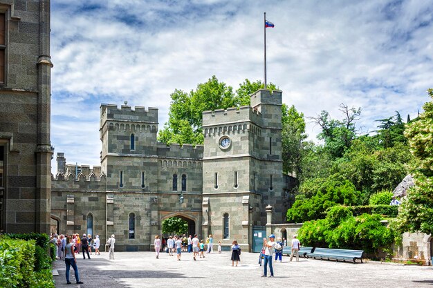 The palace square of Vorontsov Castle in Crimea is filled with tourists