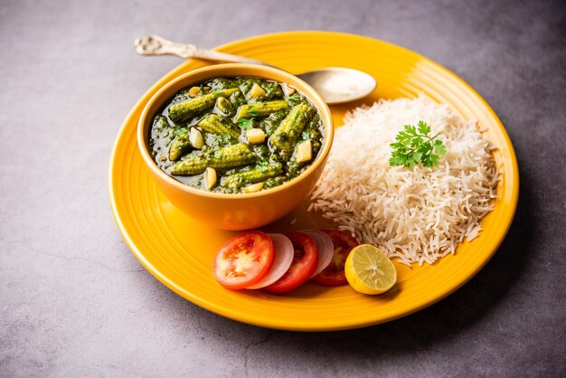 palak baby corn sabzi also known as spinach makai curry served with rice or roti Indian food