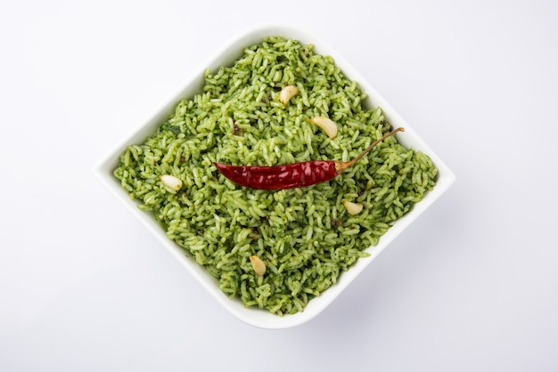 Palak or spinach Basmati rice in a ceramic bowl