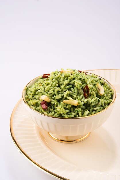 Palak or spinach Basmati rice in a ceramic bowl