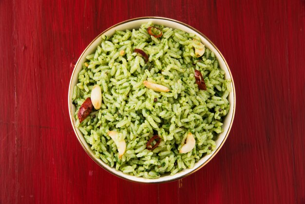 Palak or spinach basmati rice in a ceramic bowl