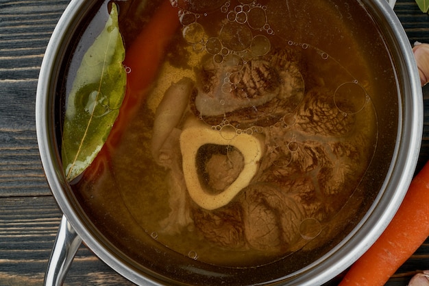 Paleo bone broth diet, beef meat soup. Low-carb food, keto recipe.