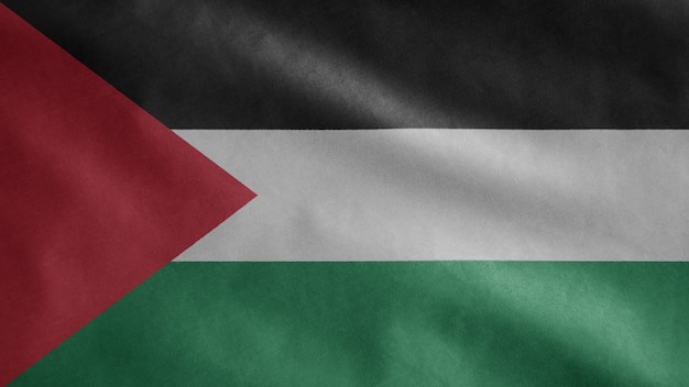 Фото Палестинский флаг развевается на ветру. закройте шаблон дует палестина, мягкий и гладкий шелк. предпосылка прапорщика текстуры ткани ткани.