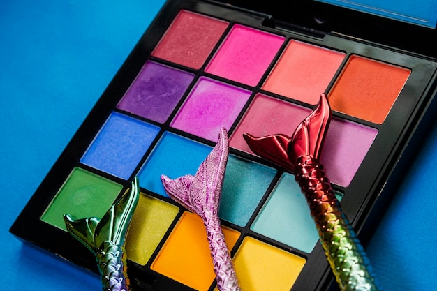 Photo palette of colored eyeshadows closeup