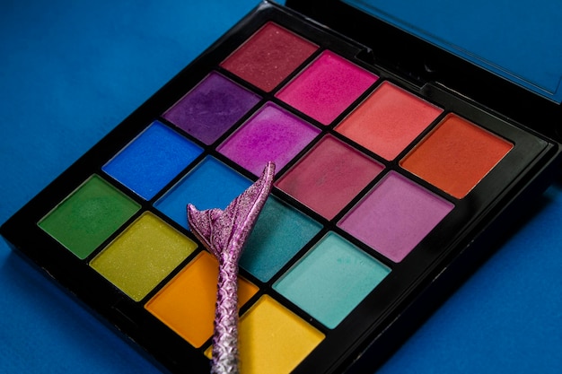 Palette of colored eyeshadows closeup