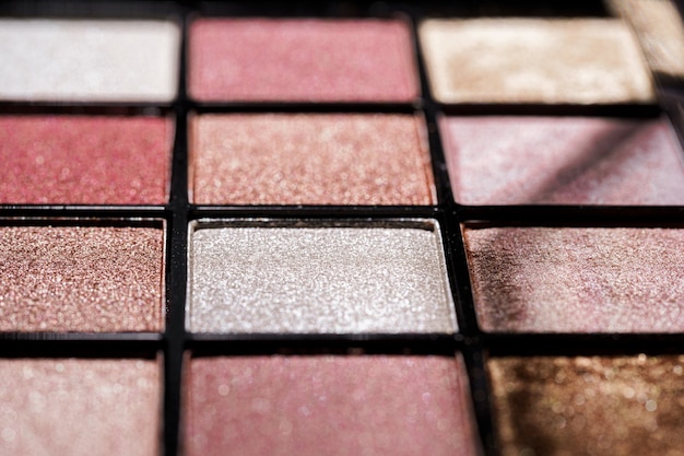 Palette of colorful eye shadows close up