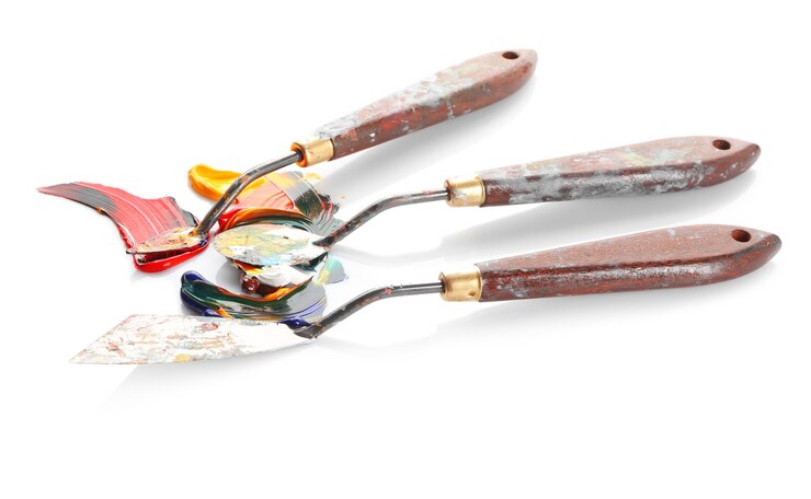 Photo palette knives with paints on white