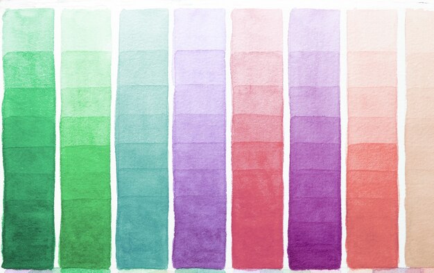 Palette of shades watercolors different colors painted on white paper. Sample of paint spectrum.