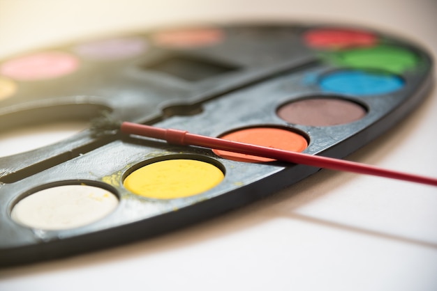 Photo palette of water color tray on white background