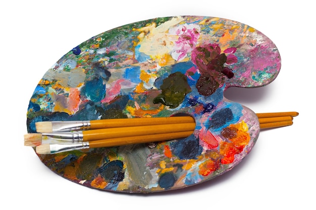 pallette with brushes on a white background