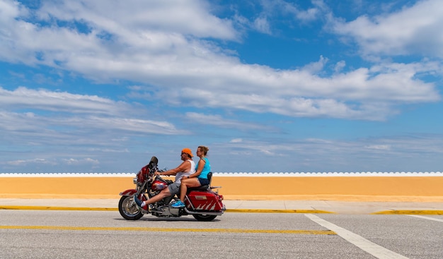 Palm Beach Florida USA March 21 2021 side view of HarleyDavidson Road King bike on road in palm beach