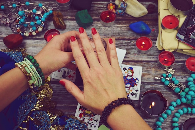 Palm divination Magic and fraud A woman fortuneteller predicts the future