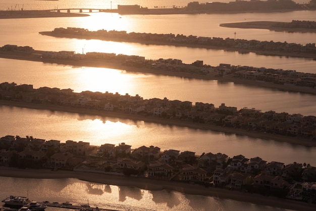 Palm Jumeirah island in Dubai on sunset modern architecture beaches and villas