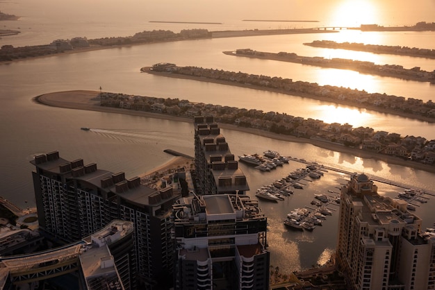 Palm Jumeirah island in Dubai on sunset modern architecture beaches and villas