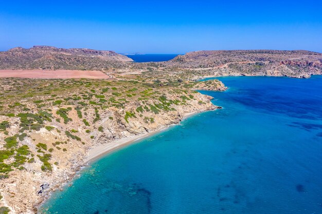 Palm Vai Beach Crete Greece beautiful drone aerial view of rocky beach blue water sky