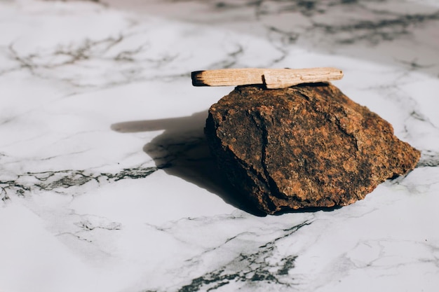 palo santo stick on stone