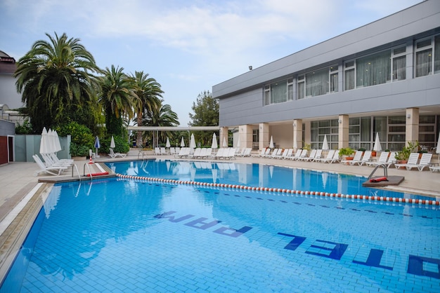 Photo pam hotel view from the courtyard pool and restaurant tables thermal balneotherapy hotel