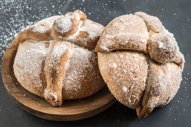 Pan de muerto with typical Mexican food