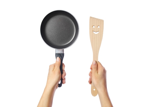 Pan in hands on a white background