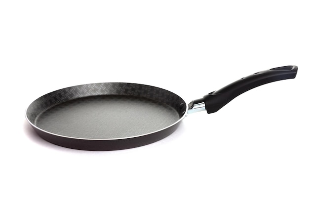 Pan for pancakes and pancakes black with nonstick coating on a white background