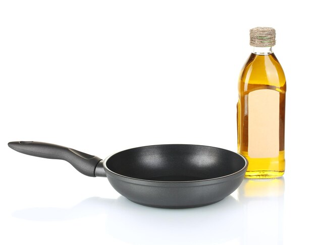 Photo pan with bottle of oil isolated on white