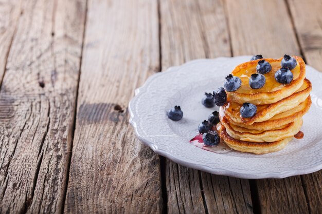 Pancake folded stack of with liquid honey 