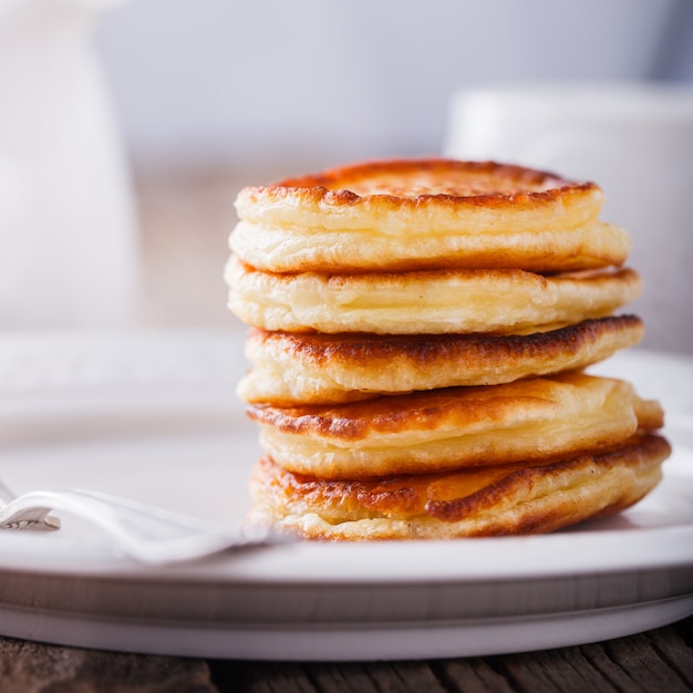 Pancake folded stack on wooden background