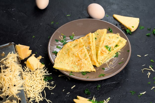 Pancake with cheese, herbs and egg