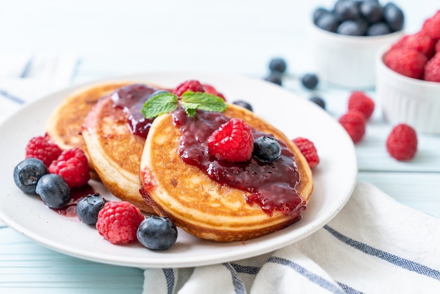 pancake with fresh raspberries and blueberries