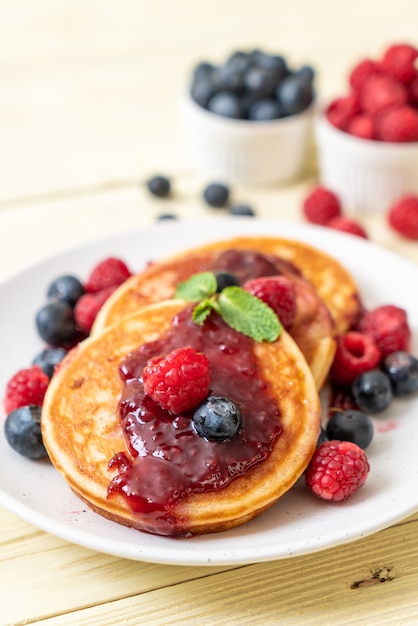 pancake with fresh raspberries and blueberries