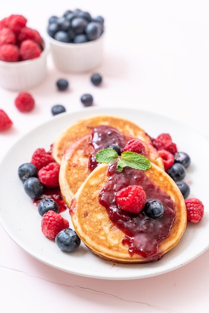 pancake with fresh raspberries and blueberries