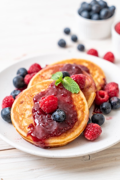 pancake with fresh raspberries and blueberries