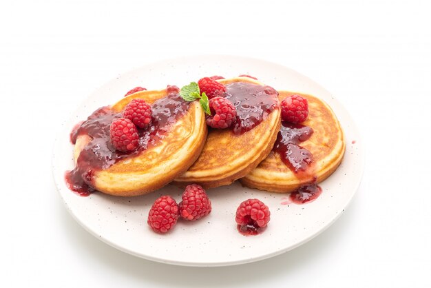 pancake with fresh raspberries and raspberry sauce