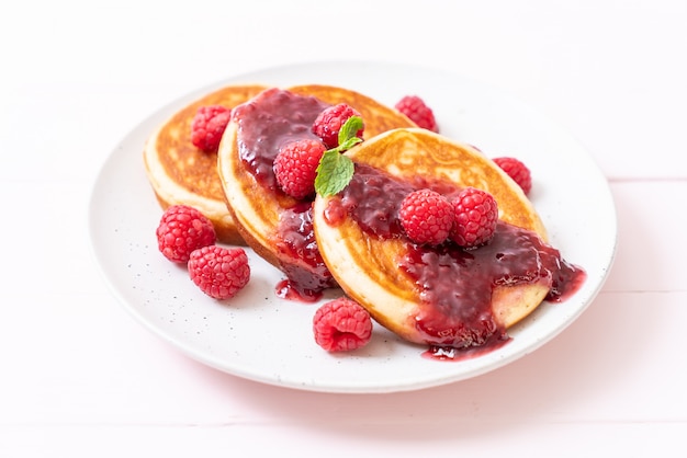 pancake with fresh raspberries and raspberry sauce