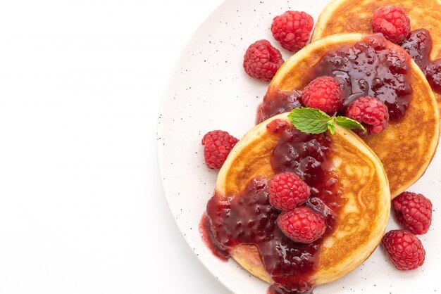 pancake with fresh raspberries and raspberry sauce