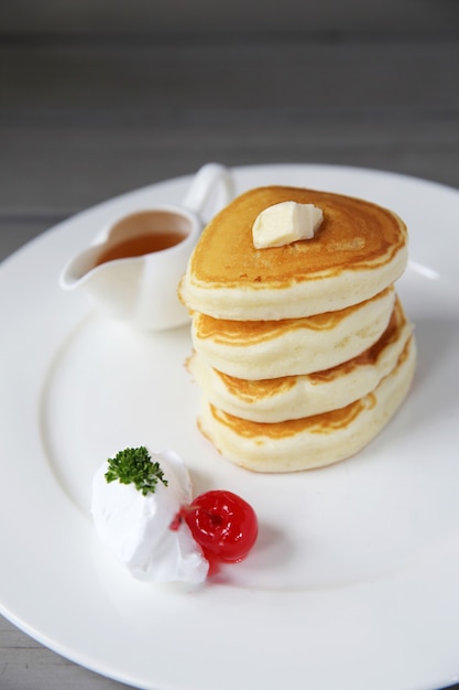 Pancake with honey and strawberry