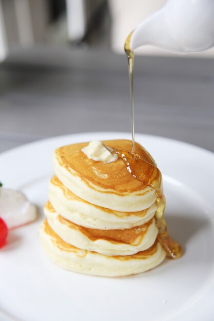 Pancake with honey and strawberry