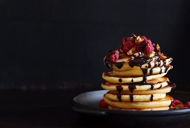 Pancake with raspberries, almonds and chocolate